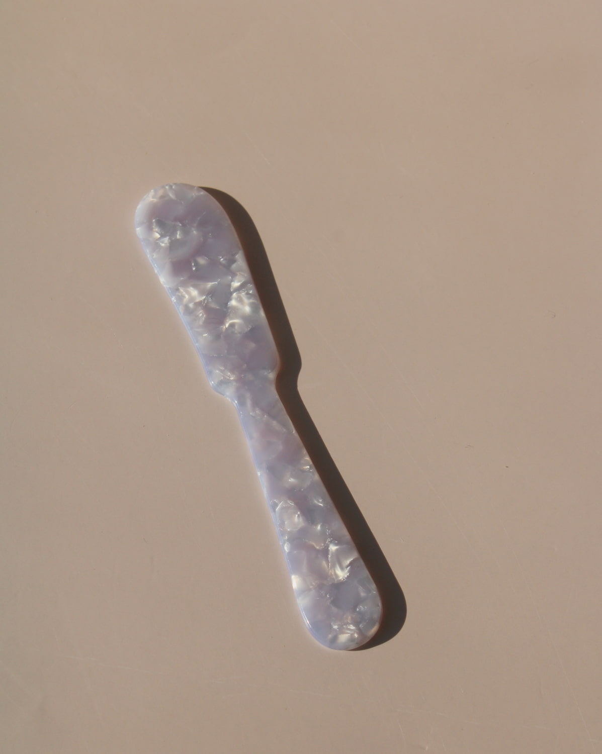 Lavender marbled resin dessert spoons with pearlescent finish, aesthetic acrylic tableware.