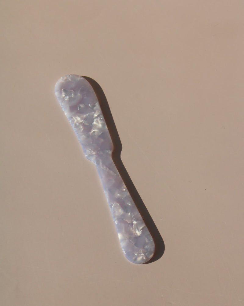 Lavender marbled resin dessert spoons with pearlescent finish, aesthetic acrylic tableware.