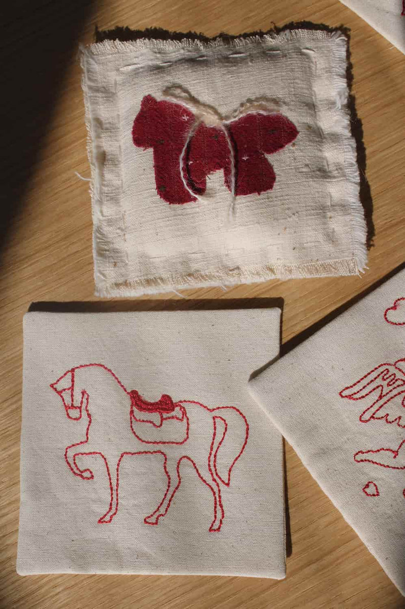 Cavalier Handsewn Embroidered Coaster with butterfly embroidery and horse stitched cotton drink coaster.

