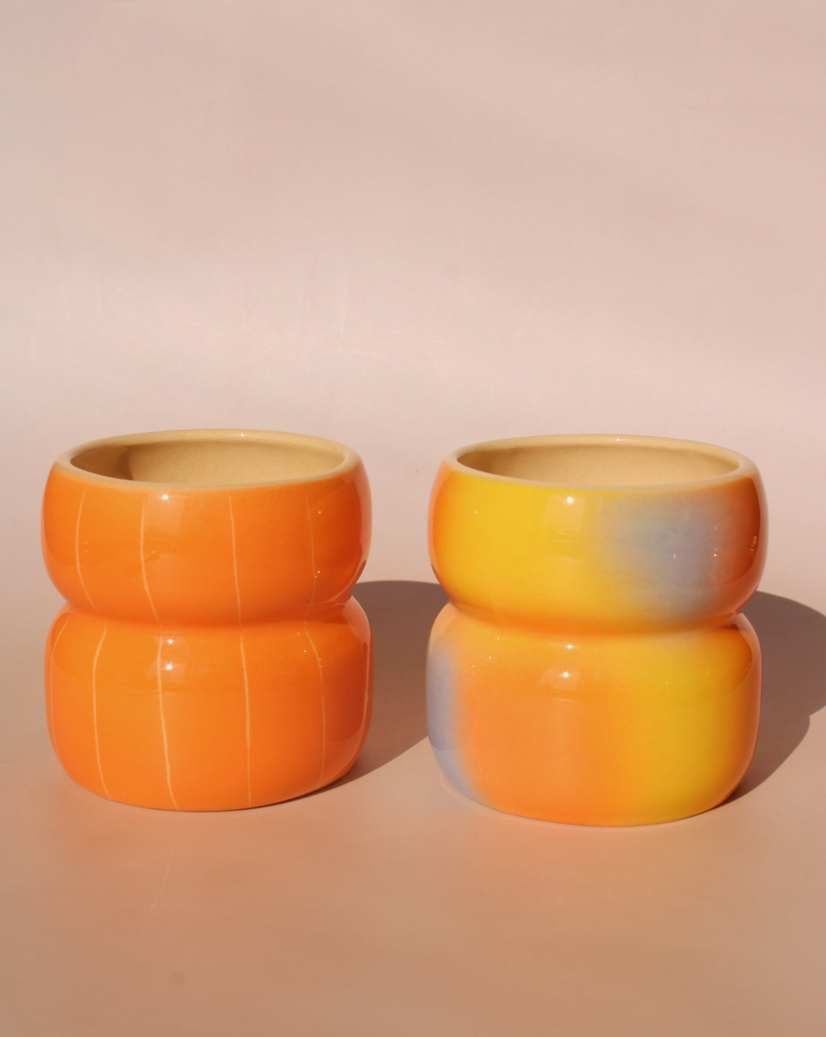 Belly ceramic mugs by Agata Puławska in mixed gradient glazes colorful handmade coffee cups collection