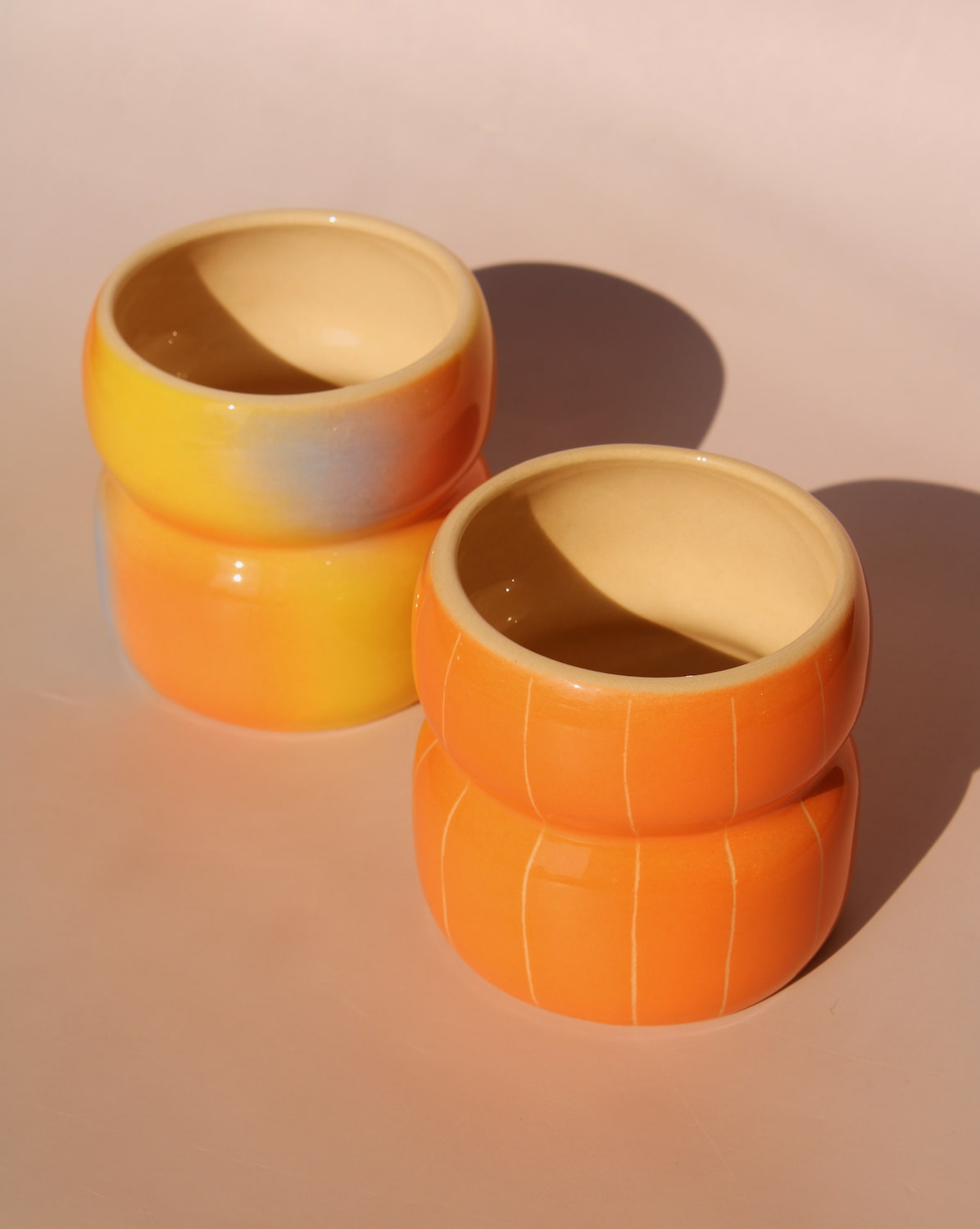 Belly ceramic mugs by Agata Puławska in mixed gradient glazes colorful handmade coffee cups collection