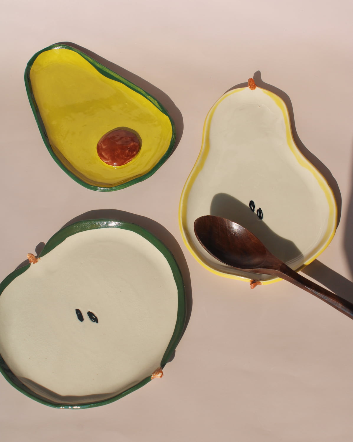 handmade ceramic fruit plates and spoon rest set playful kitchen ceramics avocado pear apple plates by Elisa Ceramics