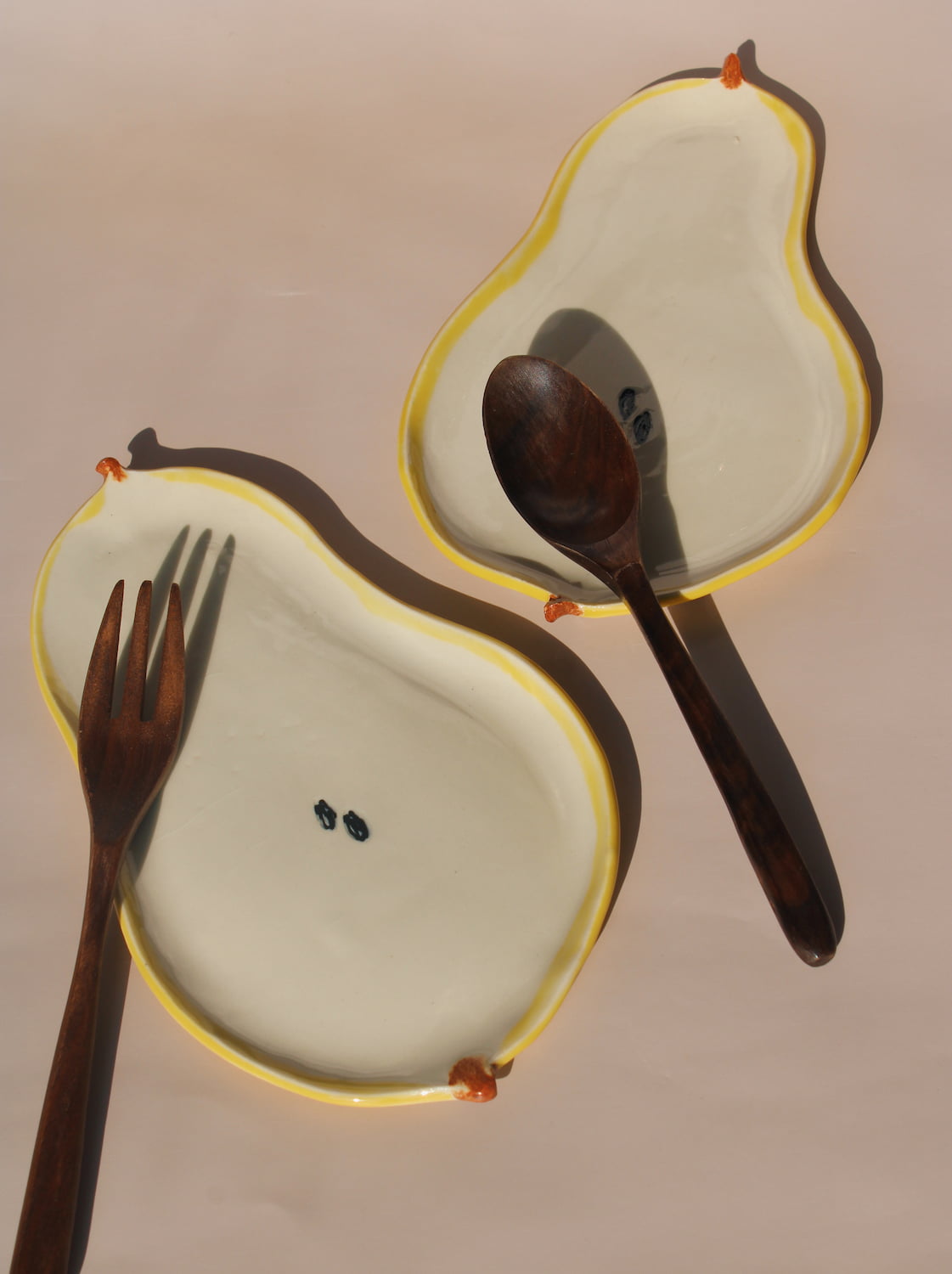 handmade ceramic pear spoon rest kitchen utensil holder by Elisa Ceramics fruit shaped spoon holder