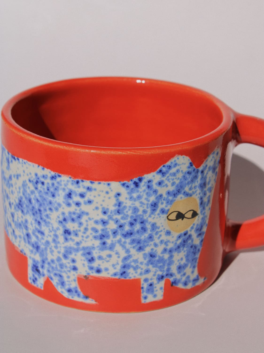 Scarlet Ceramic Cat Mugs by Marta Shurpakova – red handmade ceramic mug with hand-painted cat designs 