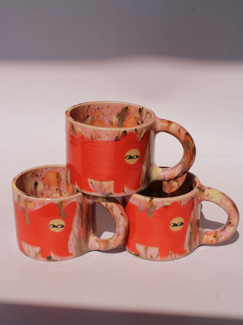 Poppy Ceramic Cat Mugs by Marta Shurpakova – three stacked handmade ceramic mugs with hand-painted cat designs