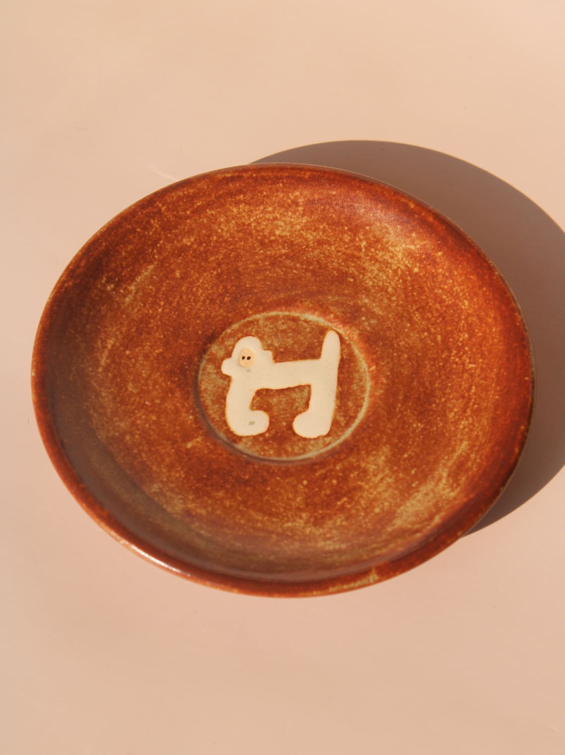 handmade ceramic monkey dessert plate by Marta Shurpakova chestnut glaze artisan snack plate