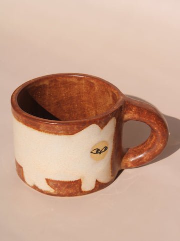 handmade chestnut ceramic cat mug by Marta Shurpakova artisan espresso coffee cup with hand painted cat illustration