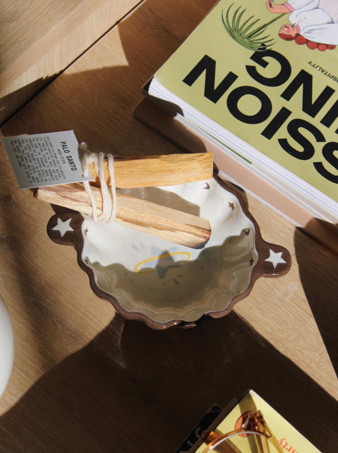 nebula ceramic sauce bowl with incense sticks