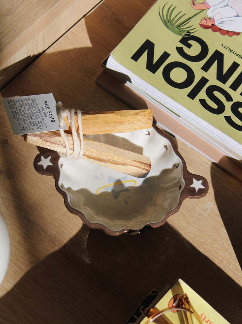 nebula ceramic sauce bowl with incense sticks