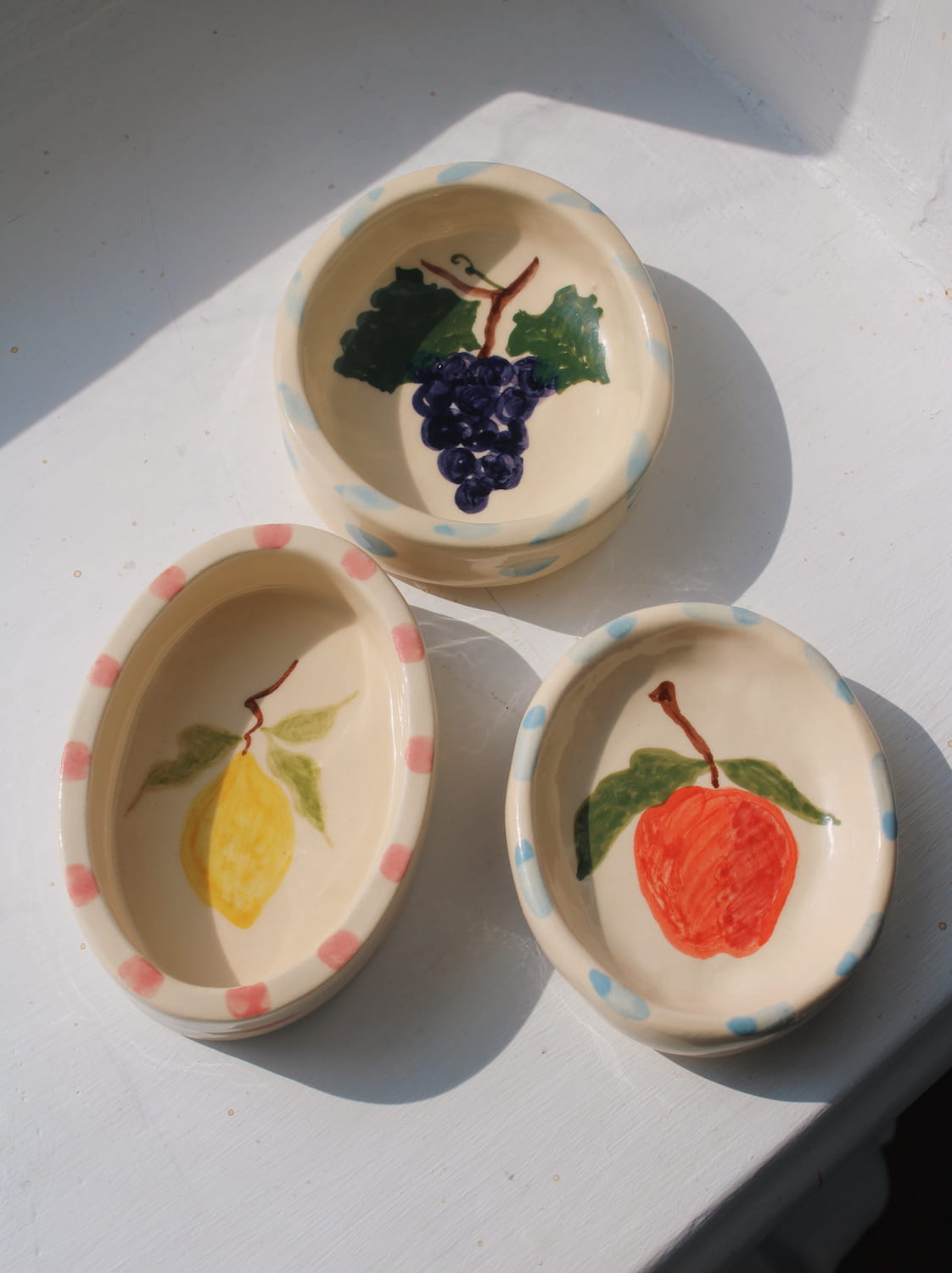 ceramic trinket dishes by Shannon O’Callaghan handmade fruit ring holder dishes lemon cherry and grape