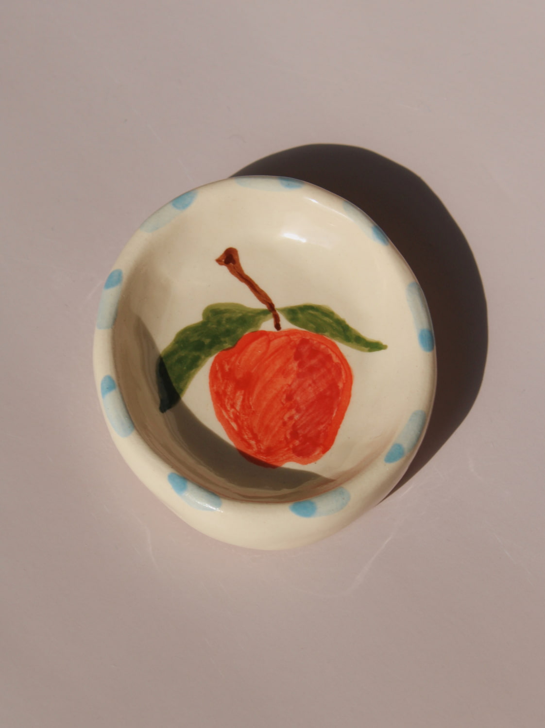 Pomina ceramic trinket dish by Shannon O’Callaghan handmade red fruit ring holder jewelry dish