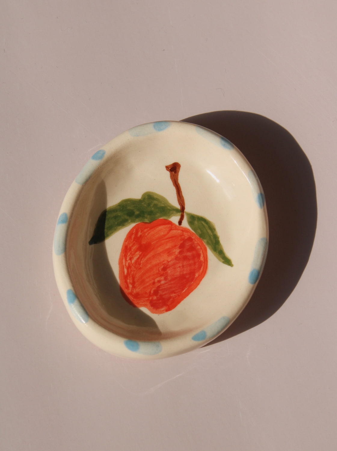 Pomina ceramic trinket dish by Shannon O’Callaghan handmade red fruit ring holder jewelry dish