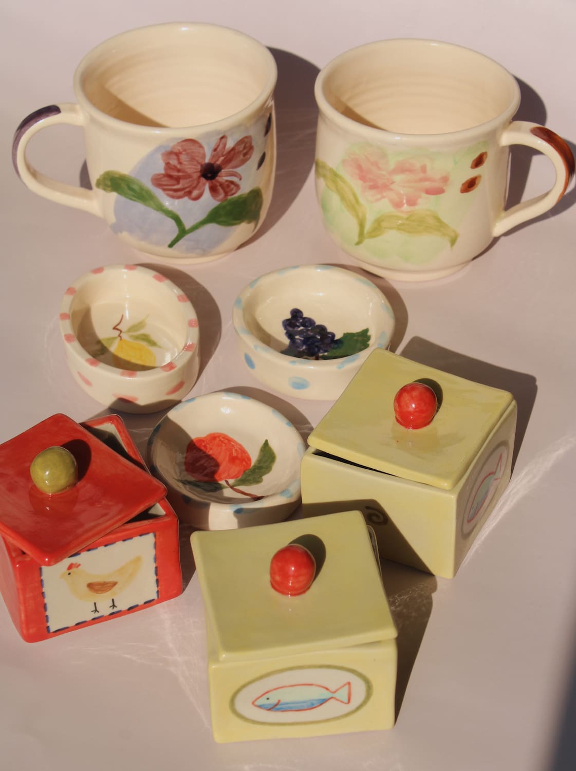 handmade ceramic mugs and trinket dishes by Shannon O’Callaghan floral pottery set aesthetic tableware and small ceramic objects